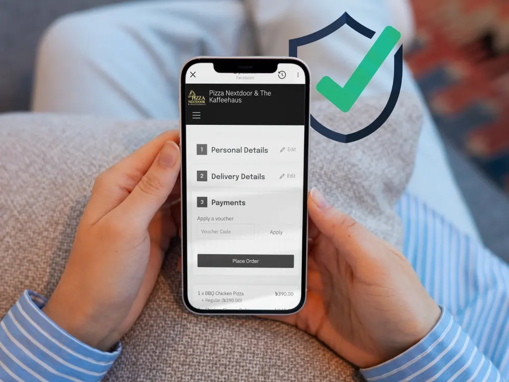 Waiter using a handheld device to take orders