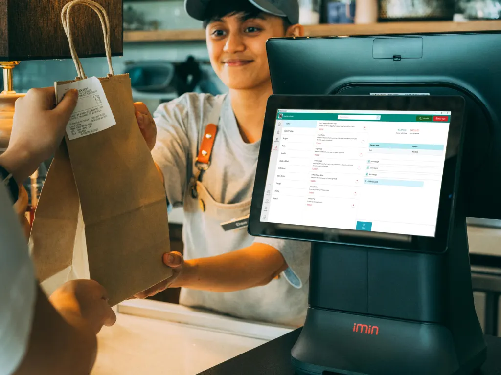 Android tablet and Windows desktop running restaurant POS software